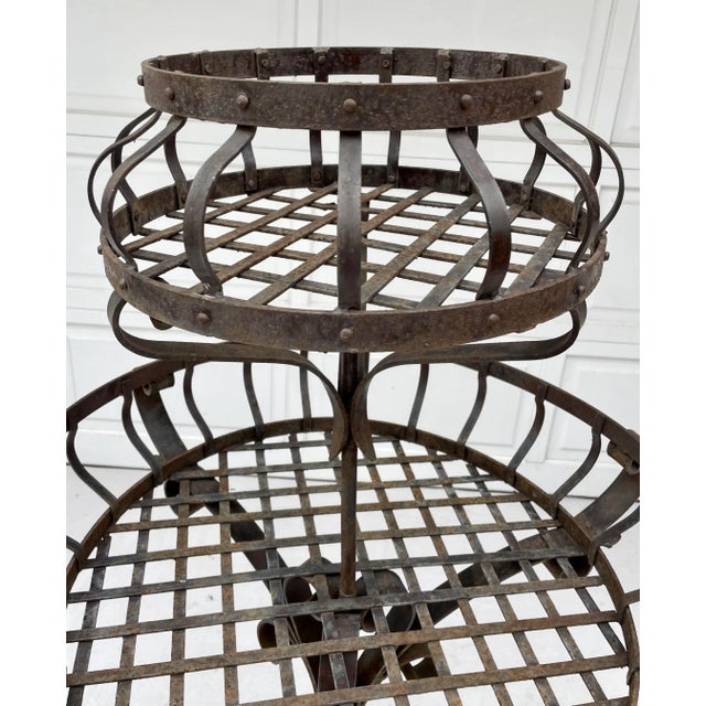 Here is an incredible antiqued iron metal French garden stand that is just under 5ft tall. The stand is very heavy and...