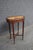 Edwardian mahogany cocktail table featuring an oval parquetry top with radiating veneers and a finely detailed shell inlay...