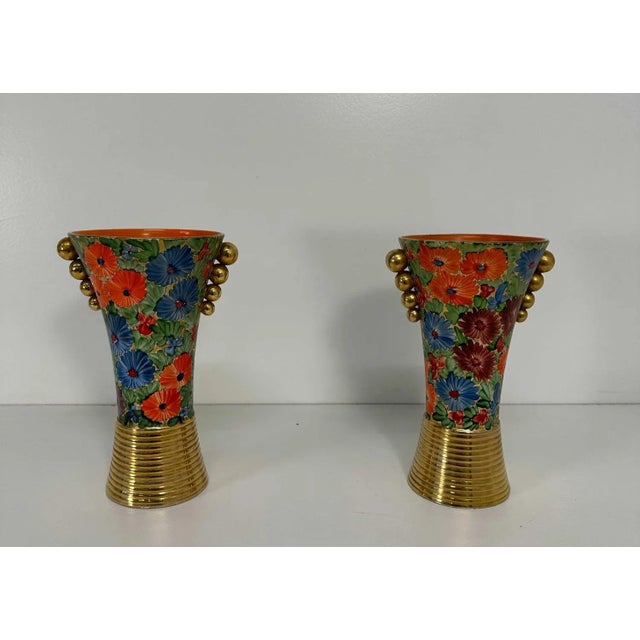 This beautiful pair of Art Deco vases was produced in Italy in the 1940s. They are completely in polychromic polished...