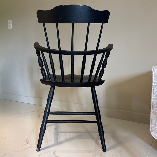 Lovely pair of arm chairs. They have been painted in a matte black, but can certainly be refinished. Would love to hang on...