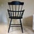 Lovely pair of arm chairs. They have been painted in a matte black, but can certainly be refinished. Would love to hang on...