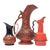 Unusual Burnt Orange Ceramic Pitcher Curation - Group of 3 For Sale