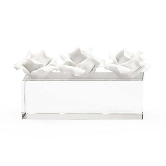 Beautiful and delicate ceramic roses with hand applied petals on a solid crystal base. Designed by Claire Bell.