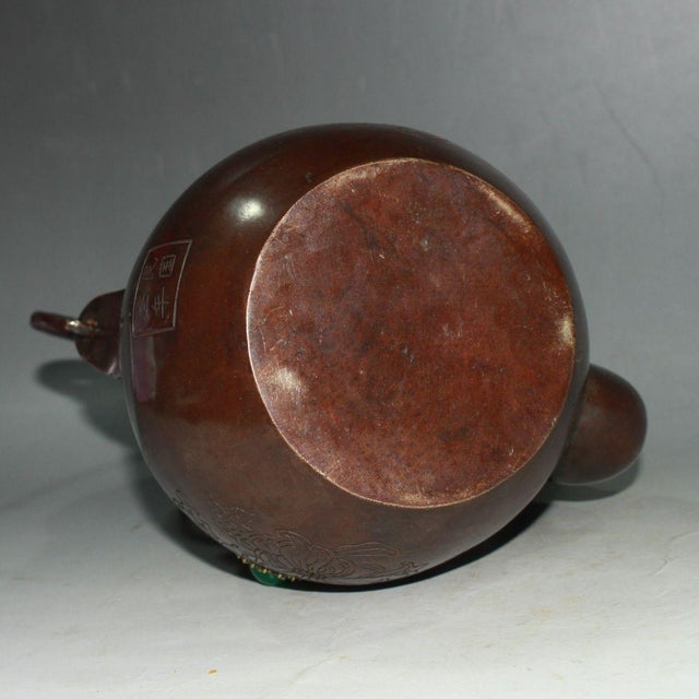 This striking vintage copper pot is a beautiful example of Chinese-inspired metalwork. Crafted from copper with a rich,...