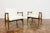 A pair of armchairs "gfm87," designed by juliusz kędziorek and produced in the gościcińska furniture factory in the 1960s,...