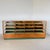 A beautiful, handcrafted display counter from the 1950s. It is made of oak. The glass panels all around provide ample...