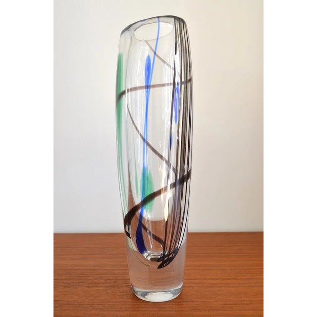 Scandinavian glass vase " Abstracta " by designer Vicke Lindstrand for the Swedish glass manufacturer Kosta. The vase is...