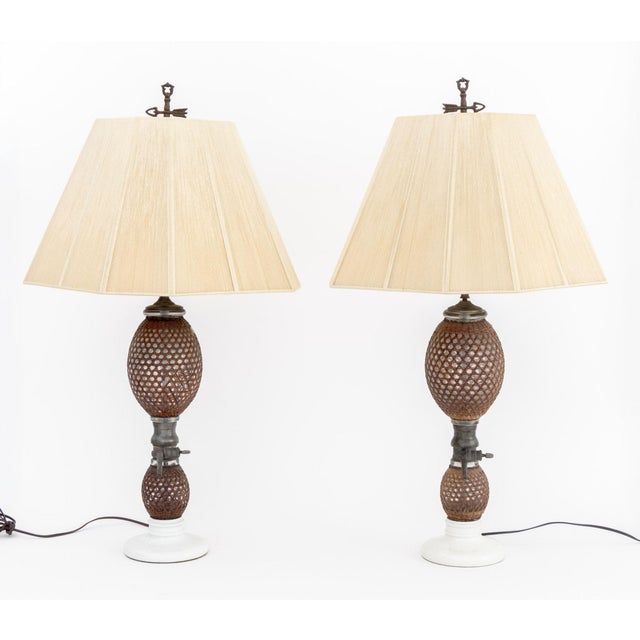Pair of French Briet Brevete Seltzer Bottle Table Lamps, 19th century, glass globes wrapped in rattan mounted on circular...
