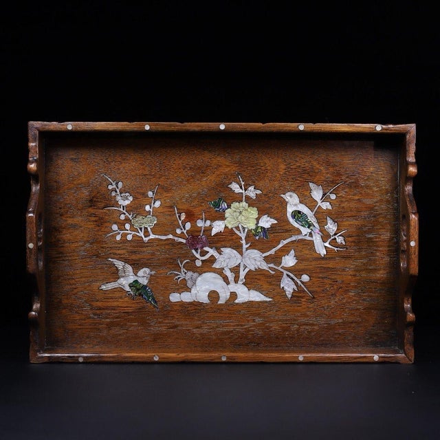 This is an exquisite vintage wooden tray featuring intricate mother-of-pearl (nacre) inlay work. Crafted from a richly...