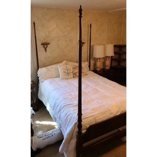 Ethan Allen queen poster bed . Georgian Court line. Classic four poster bed frame crafted from dark finished wood. The...