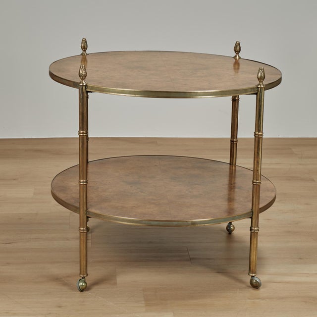 Chic mid century table or stand having two round tiers of burled walnut with bass faux bamboo supports with classic...