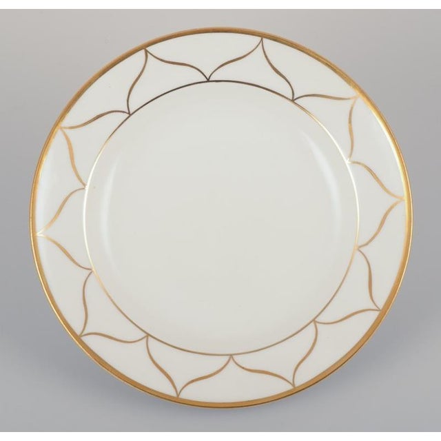 Meissen, Germany. A set of six plates. White porcelain with gold decoration. Art Deco. Rare model. Ca. 1930. Marked....