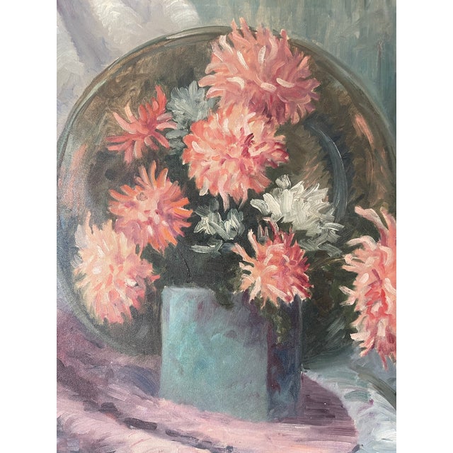 This oil painting is a French floral still life style featuring pink and white dahlias or chrysanthemums arranged in a...