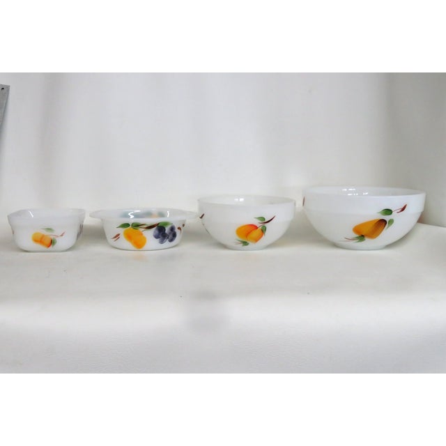 This wonderful Fire King Set of Nested Mixing / Serving Bowls is made out of white milk glass by the brand Anchor Hocking...