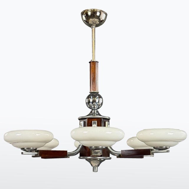 1930s Art Deco chandelier combining chromed metal and wooden arms. Fitted with six opaline glass shades. Fully rewired,...