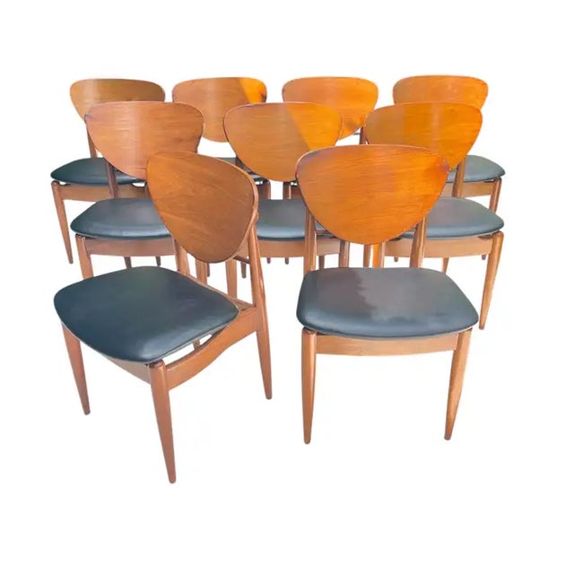 Set of 10 Danish Midcentury Modern Dining Chairs. This set includes 10 side chairs. The chairs are rendered in polished...
