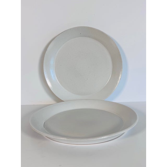 Celebrate the timeless appeal of American studio pottery with this vintage pair of Bennington Pottery dinner plates from...
