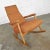 Lovely mid-century modern high back rocker comprised of an oak frame and the original nubby rust and gold chenille fabric....
