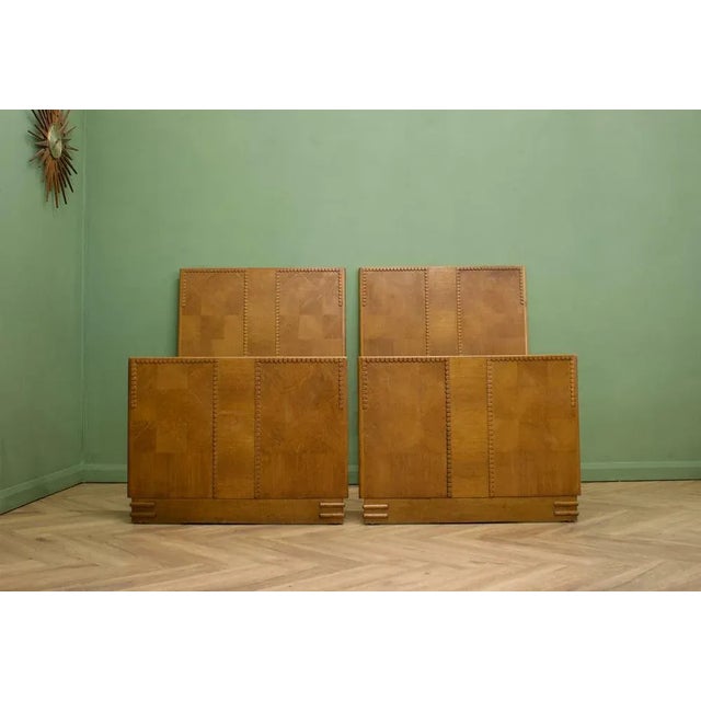 A pair of Art Deco solid oak single bed headboard and footboards - they could be fixed together to create a large bed The...