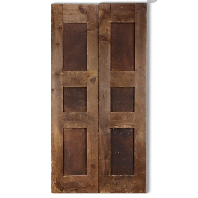 Varied tile designs in cobalt, turquoise and green set in an old wooden door Comprising ten tiles of varying designs,...