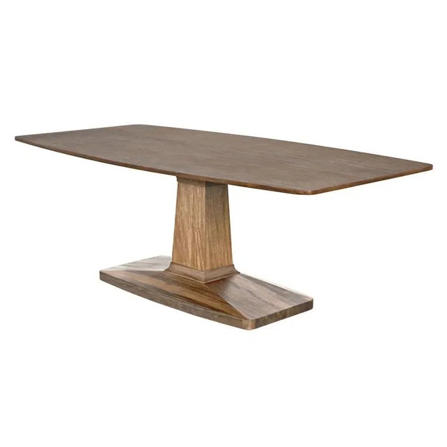 The Travis Table in Dark Walnut is a striking and elegant piece that will undoubtedly make a statement in any dining room...