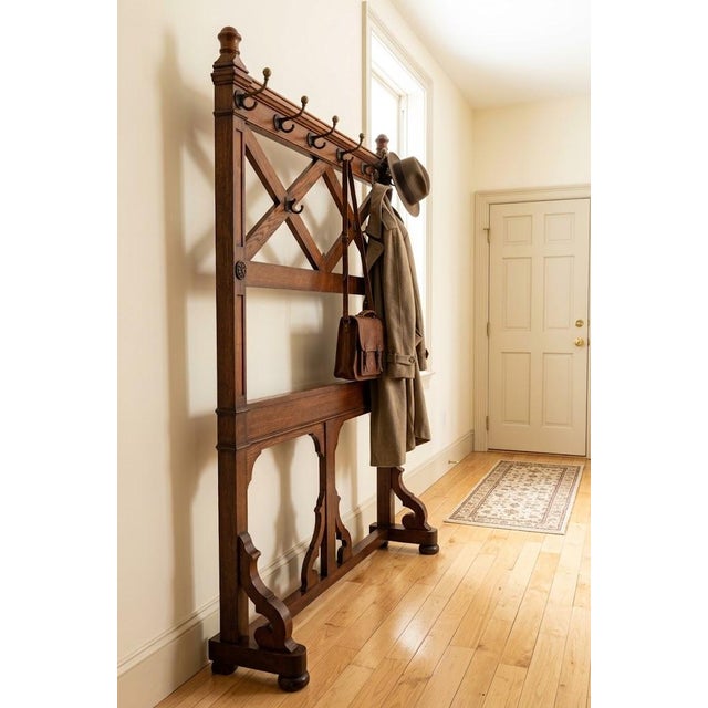 A rare and unusual victorian gothic revival solid oak hall stand, dating from circa 1860. displaying superb quality and...