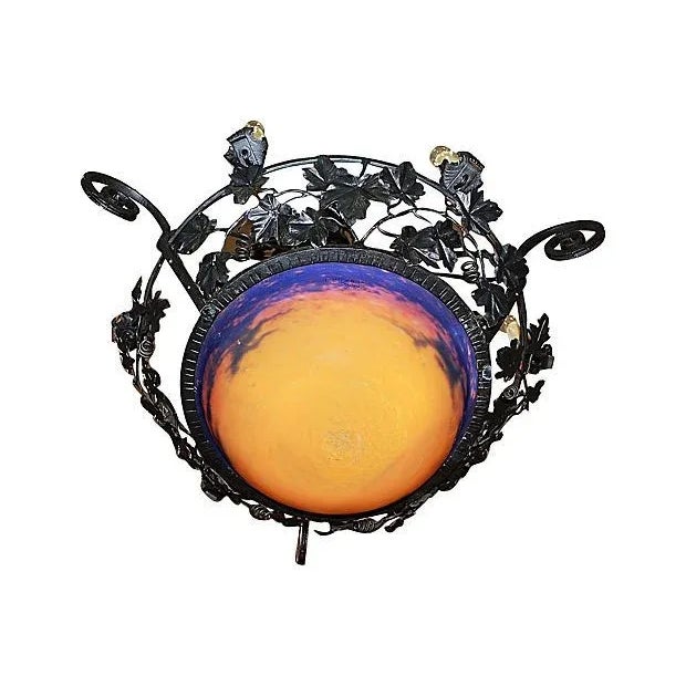 A stunning French, Art Nouveau art glass chandelier signed by famed Muller Freres of Luneville, France. It has a satin...