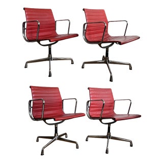 EA 108 Chairs in Chrome and Red Leather by Charles and Ray Eames for Vitra, 1950s, Set of 4 For Sale