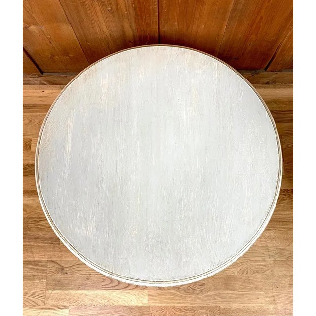 Charming round coffee table of Louis XV style in wood. This table is patinated in blue-gray tones giving it a vintage or...