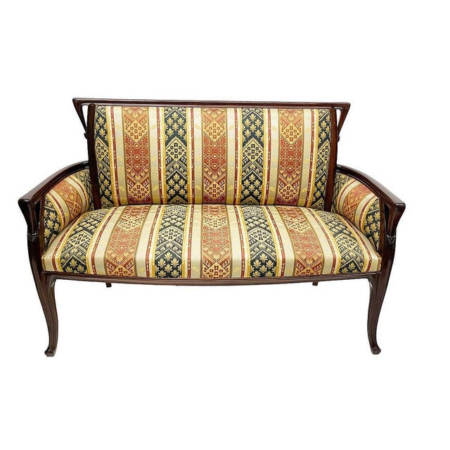 French Art Nouveau bench, sofa by Louis Majorelle, 1900-1910 A beautiful sofa with a highly polished wooden frame, covered...