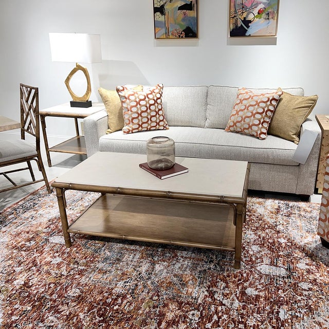 This beautiful piece features a masterfully carved faux bamboo frame that brings a touch of tropical charm to any room....