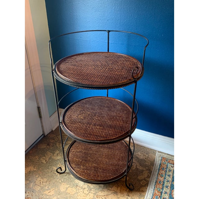 Offering a versatile iron and wicker over wood 3 tiered stand that can be used for a multitude of purposes. Works in any...