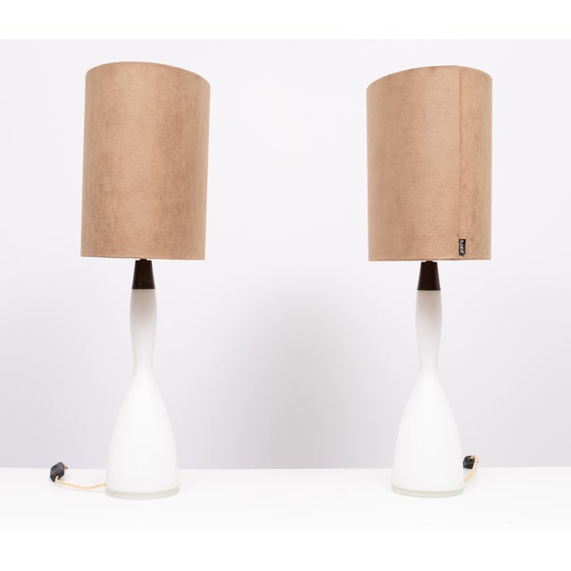 Beautiful pair of Table lamps. Opaline Glass, brass patinated tops comes with brand new custom made Gold color Velvet...