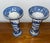 Pair Chinoiserie blue and white trumpet vases. 7.5" tall, top 3.75 wide, bottom 3" wide. Pattern is sailboats, pagodas,...