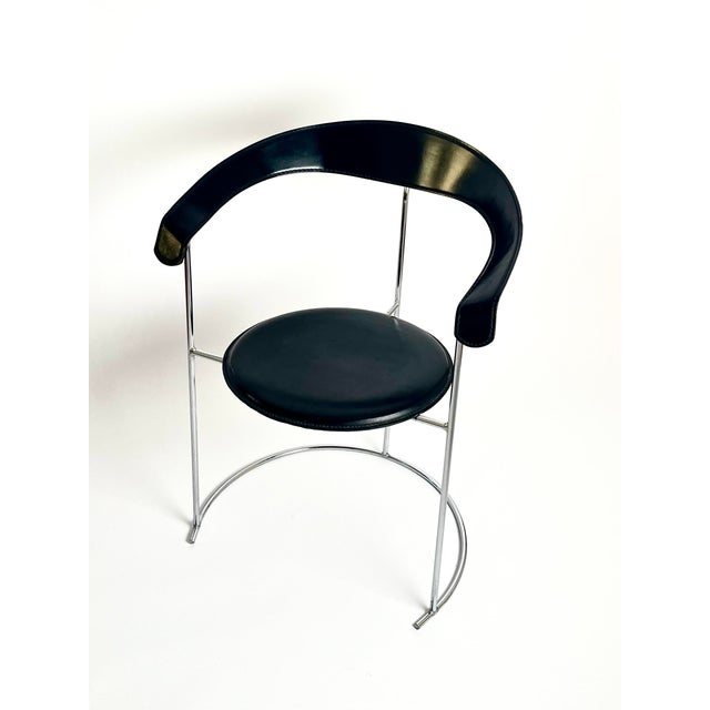 Elegant vintage “Canasta” chair by Arrben, Italy, produced between the late 1970s and early 1980s. This chair combines a...