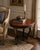 A refined example of classic French-inspired craftsmanship, this Henredon center occasional table captures the graceful...