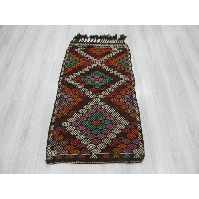 Embroidered vintage small kilim rug from Denizli region of Turkey. Approximately 45-55 years old. In good condition.