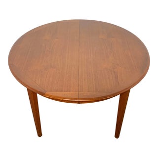 C. 1960s Danish Modern Round Teak Dining Table With Two Leaves For Sale