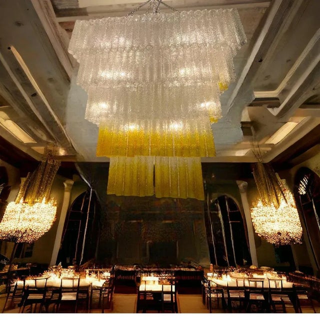 Extra large murano glass tube chandelier 1980’s 5 tiers composed of clear textured tubes mixed with gold colored tubes. 24...