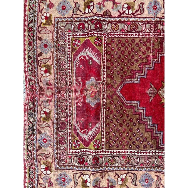 Pretty antique Turkish Anatolian rug with a nice geometrical design and beautiful colours with red, green, grey and light...