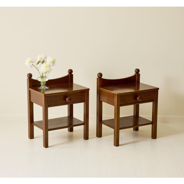 Pair of bedside tables attributed to Luigi Caccia Dominioni, produced in Italy in the 1960s. Crafted entirely in wood,...