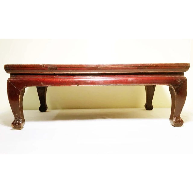 This Antique Chinese Table is known as "Kang" Table in China. The table is handcrafted in elegant Ming "Waist" furniture...