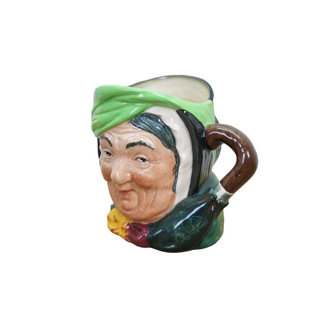 Large vintage Royal Doulton 5528 porcelain character jug of Sairey Gamp from Charles Dickens featuring a green bonnet,...