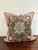 This one-of-a-kind pillow set includes a 23x23 square and a 13x23 lumbar pillow, both handcrafted from antique rug...