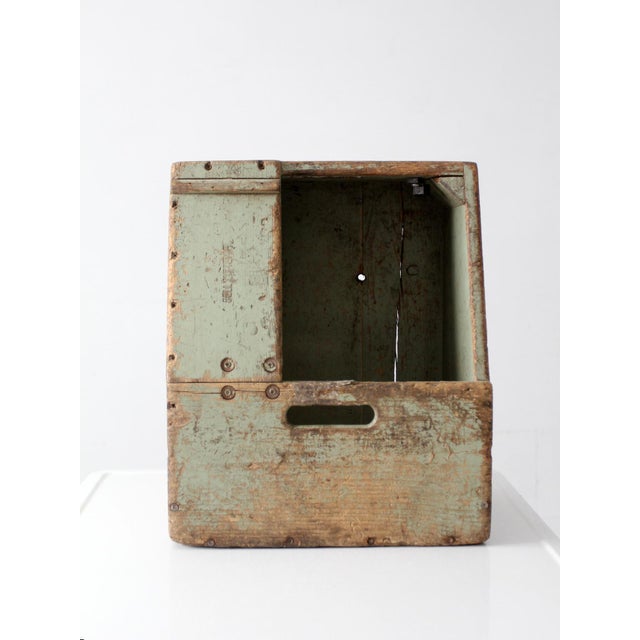 A vintage Bell System wood tool box from the 1930s–1950s, featuring a sloped front and open interior designed for...