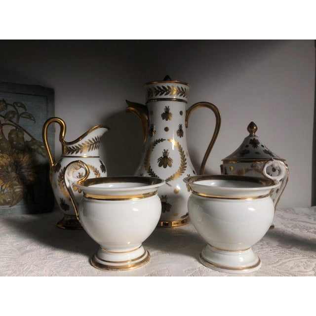 The service is made in the Empire style, has rich gilding on all items, hand-painted by the artist-decorator M. Carpezat,...
