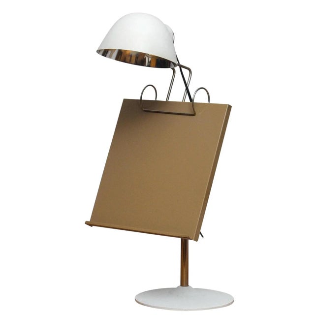 Extremely rare and beautiful table lamp with book stand attributed to Falkenberg Belysning in Sweden. The table lamp is...