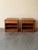 Beautiful pair of vintage Mid-Century Modern nightstands, crafted in warm teak with clean Scandinavian lines. These...