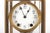 Early 20th century brass and glass crystal regulator or carriage clock with beveled four-sided glass panels, white enamel...