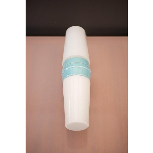 A rare and highly desirable mid-century modern double porcelain wall sconce for bathroom use, produced by ifö, sweden, in...